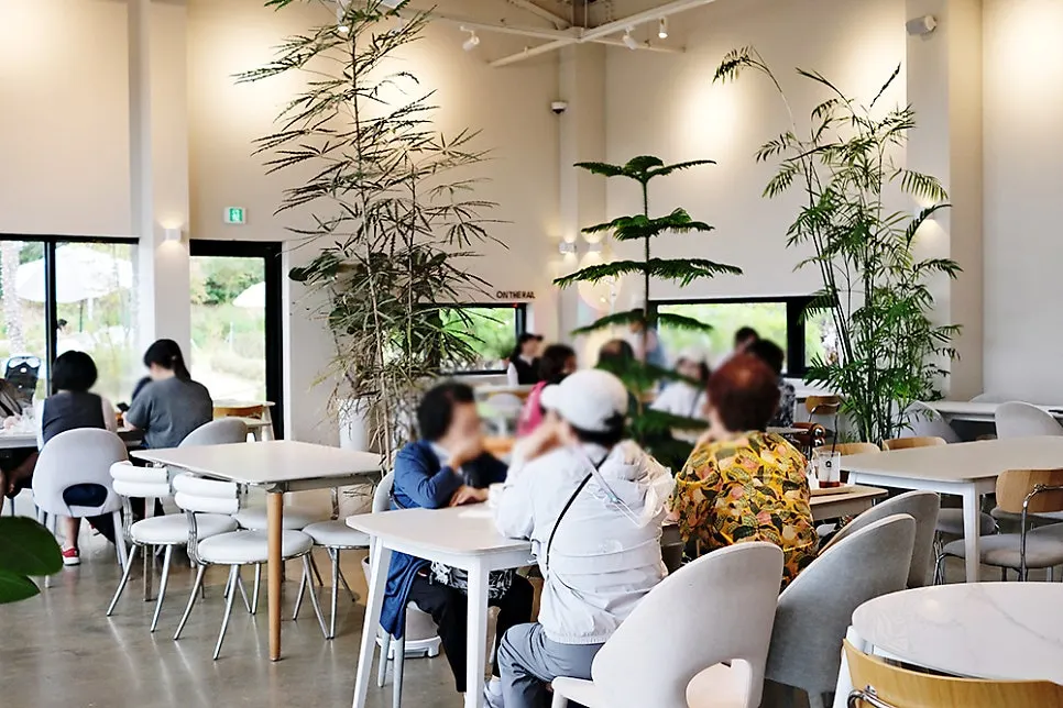 Indoor seating with a baby chair at On the Rail