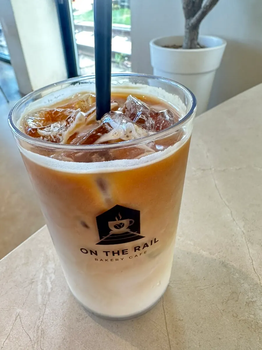Table with four drinks from On the Rail