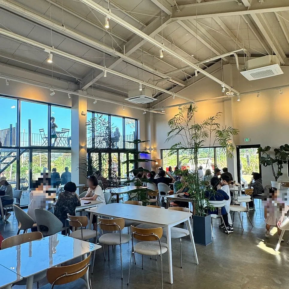 Bright, high-ceilinged interior of On the Rail's 1st floor