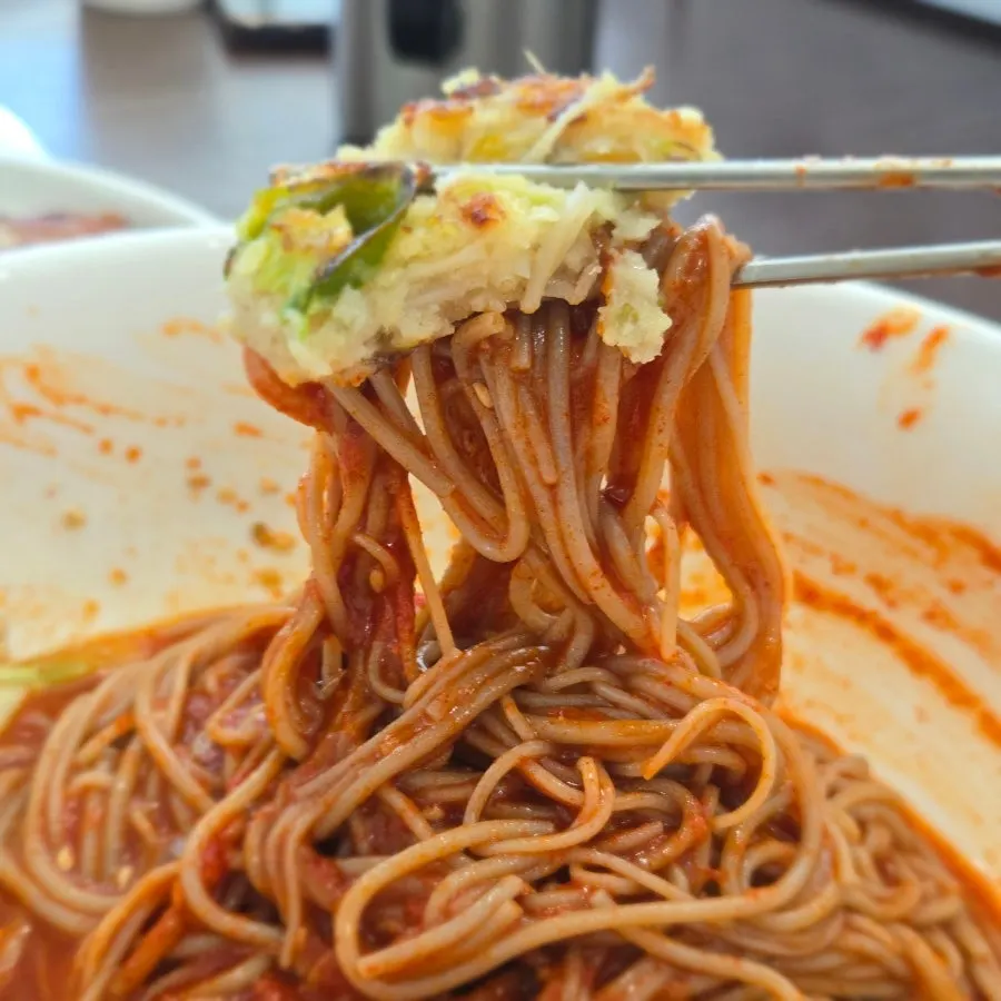 Close-up of the mixed Pyeongyang bibim makguksu noodles