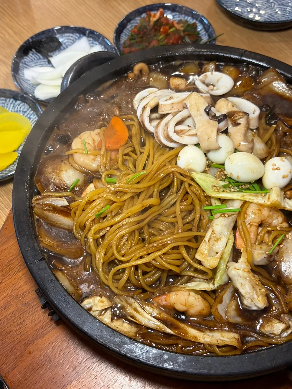 Full table with stone-plate jajangmyeon and the donttang & chitang set