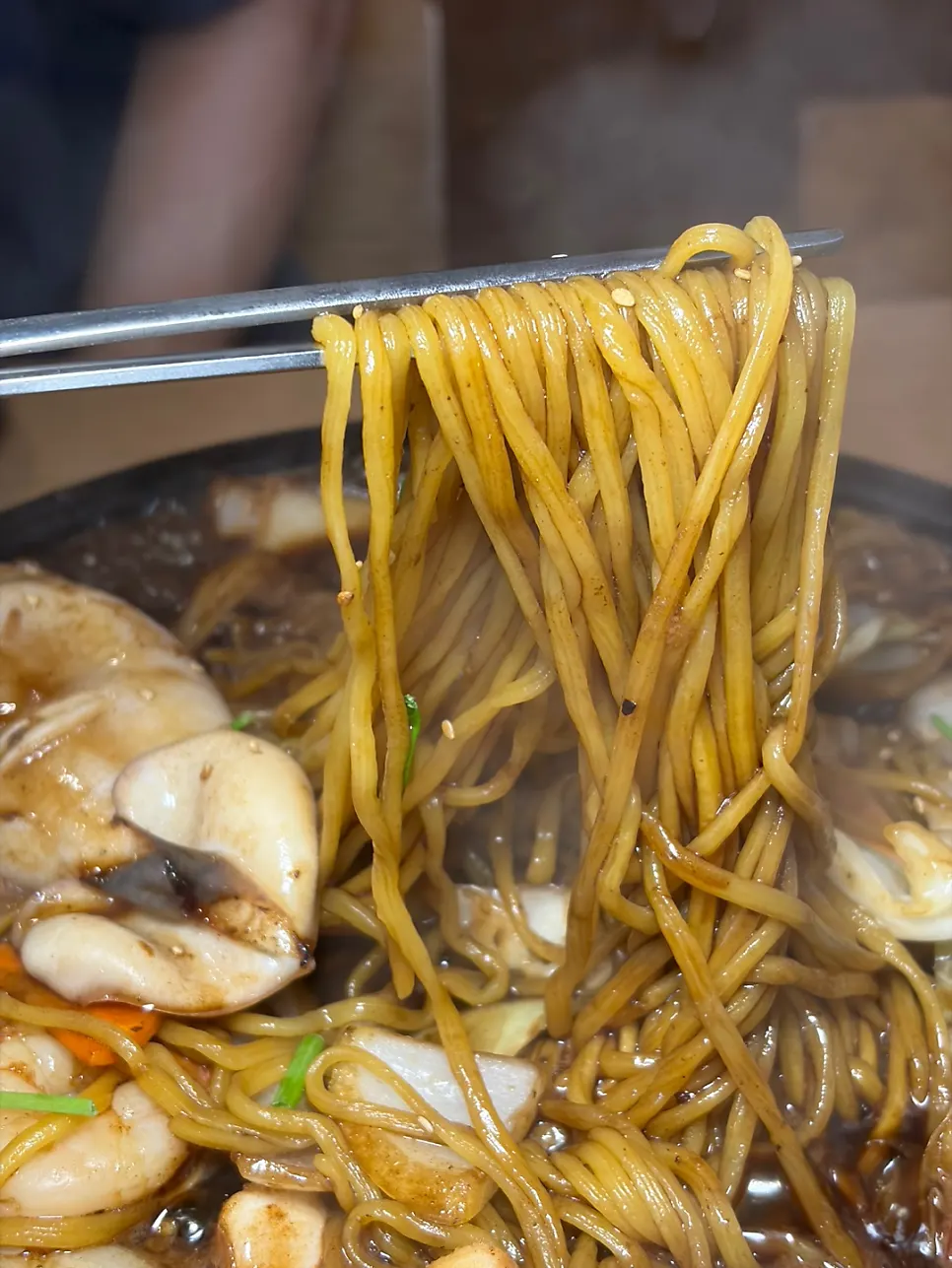 Stone-plate jajangmyeon noodles and sauce with whole squid added