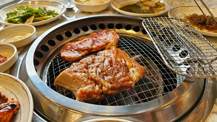 Charcoal grill brought to the table