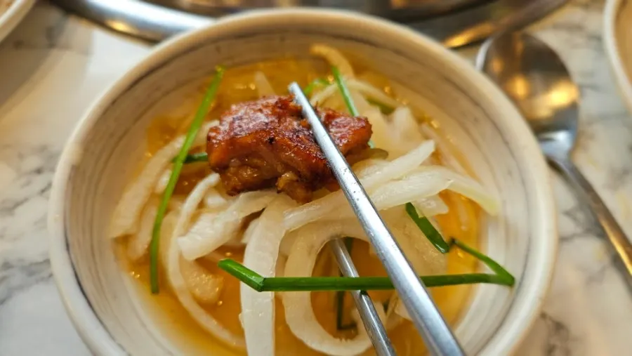 A spoonful of beef brisket soybean paste rice bowl