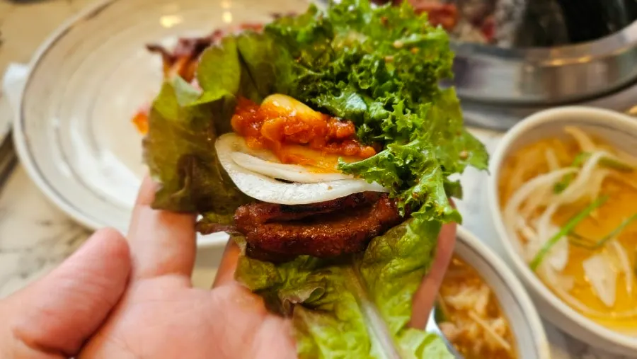A piece of pork rib placed on onion