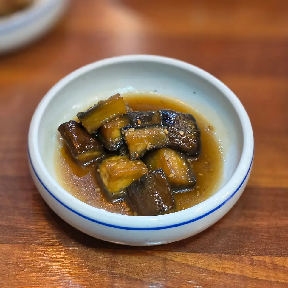 Eggplant side dish, mook, spicy radish salad, and bean sprouts