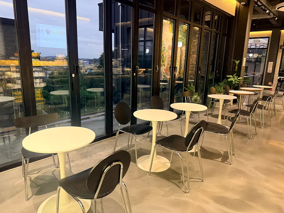 Full view of indoor tables at Fruit Forest Paju Direct Store