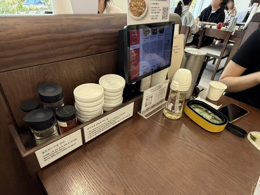 Mandu dipping sauce and condiments set on the table