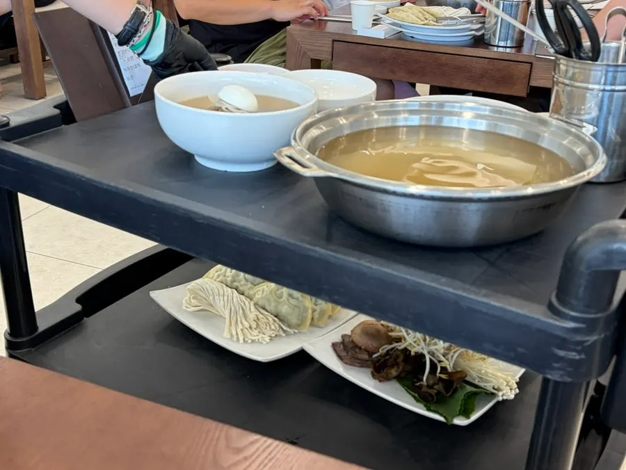 The full spread of ordered dishes on the table