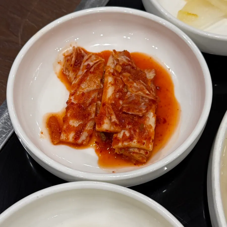 Side dish containers set up at the self-serve corner