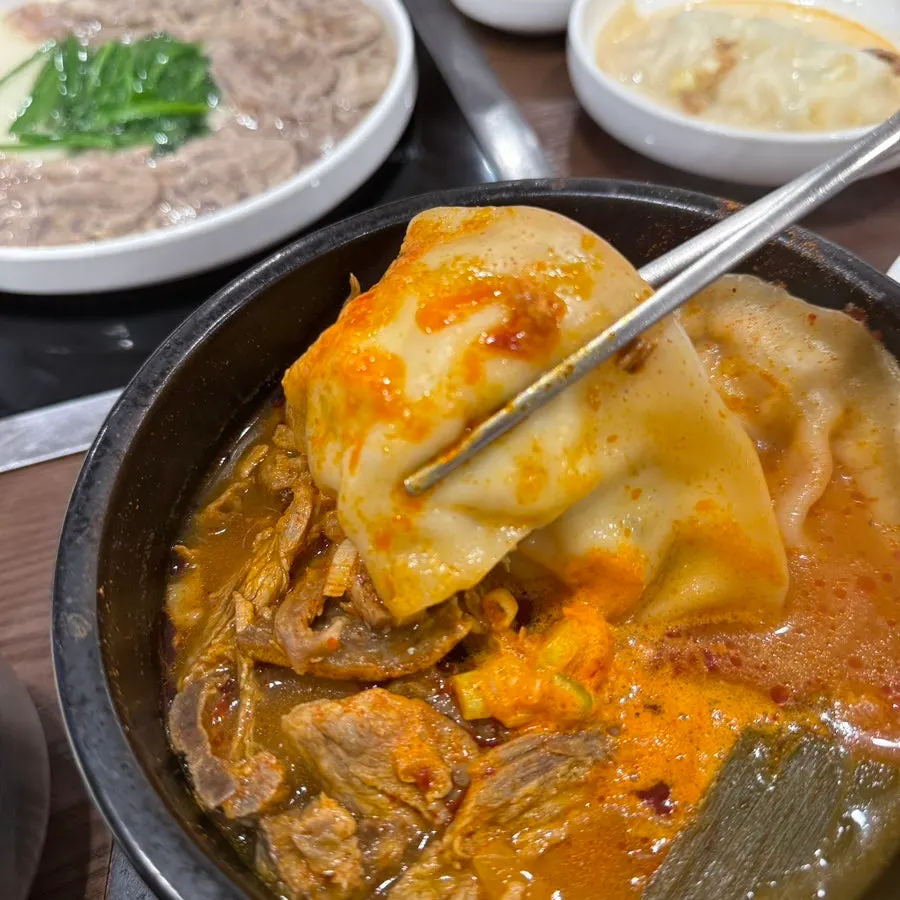 Inside the mandu jjabagi with dumplings and hanwoo beef