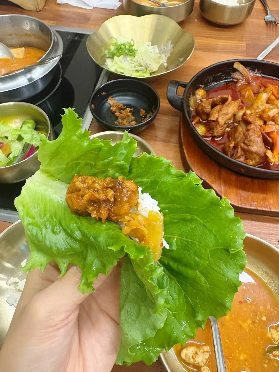 A wrap of stir-fried pork with wrap vegetables