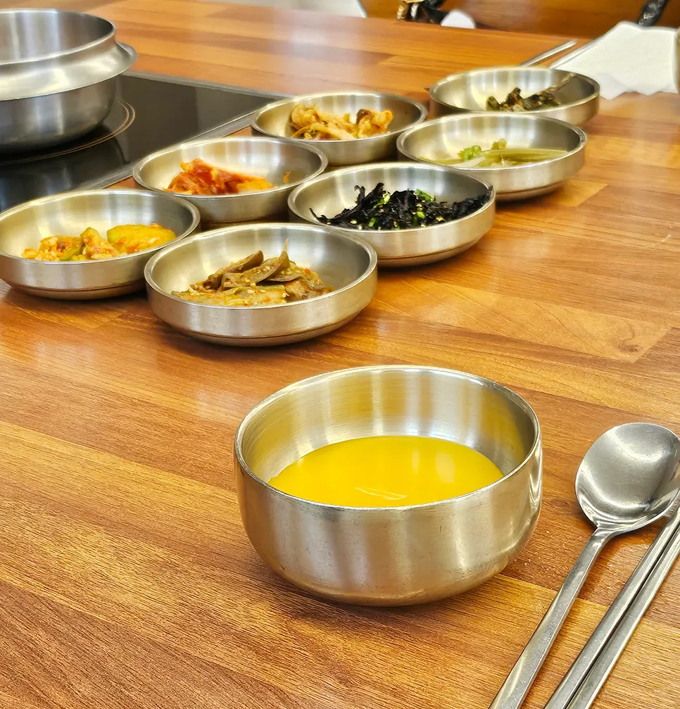 A plate of wrap vegetables and side dishes