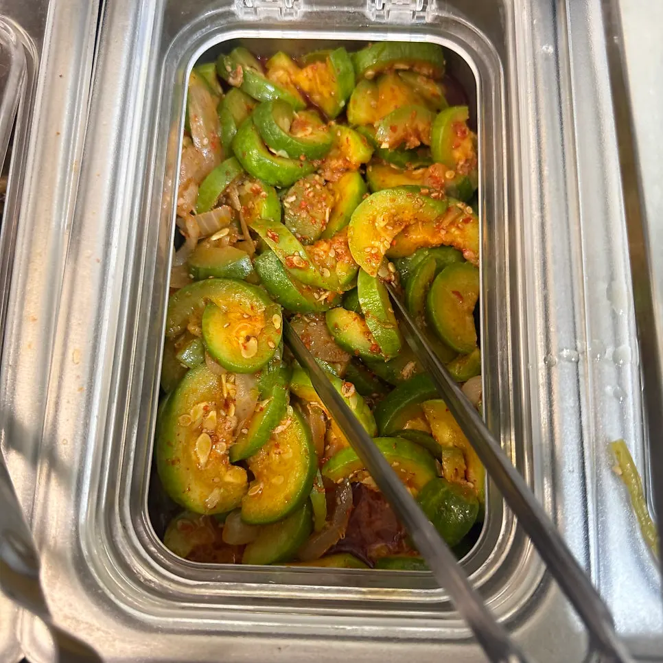 Lettuce and perilla leaves at the self-serve wrap vegetable bar