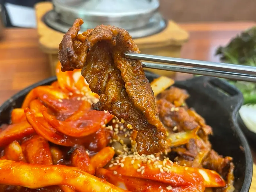 Direct-fire pork stir-fry with a smoky char