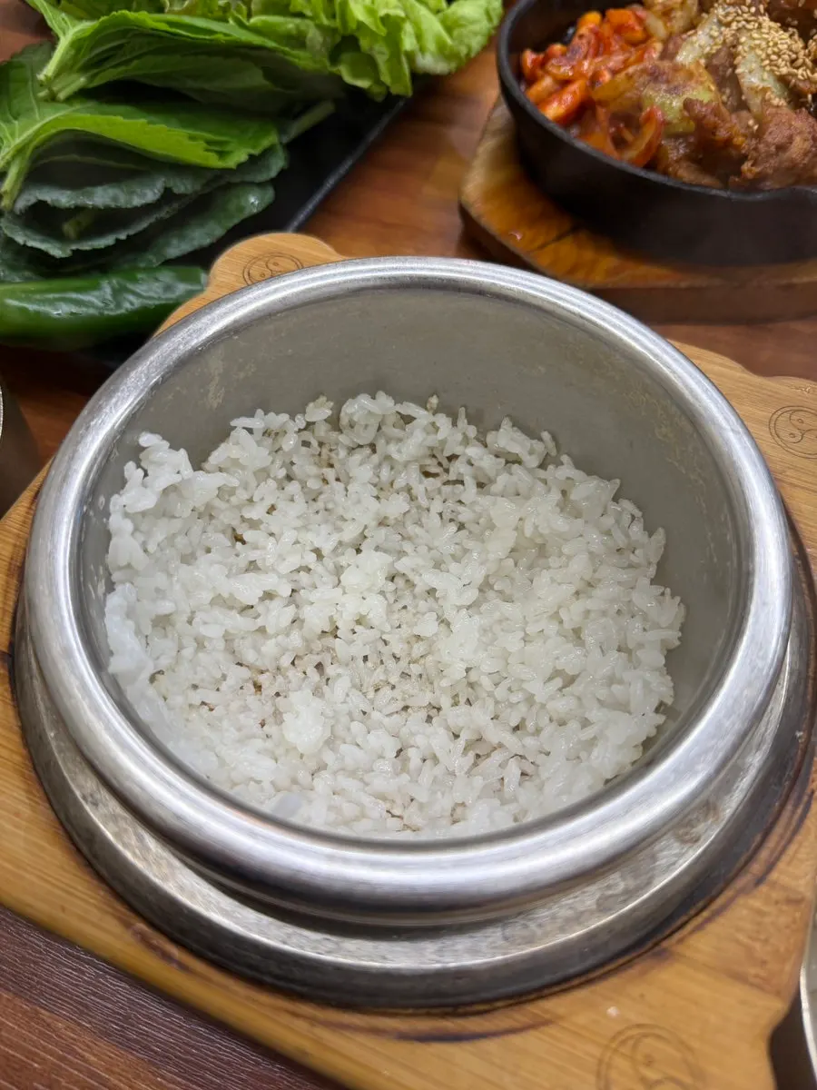 A bowl of chewy, sticky hot-pot rice