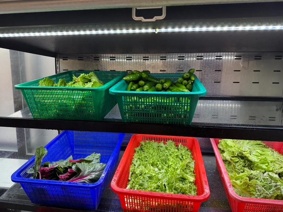 Self-serve bar with side dishes and ssam corner