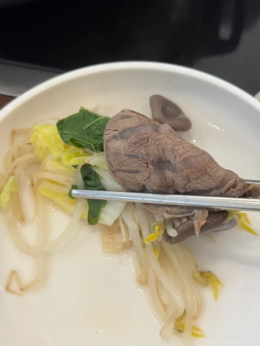 A generous handmade mandu hot-pot meal