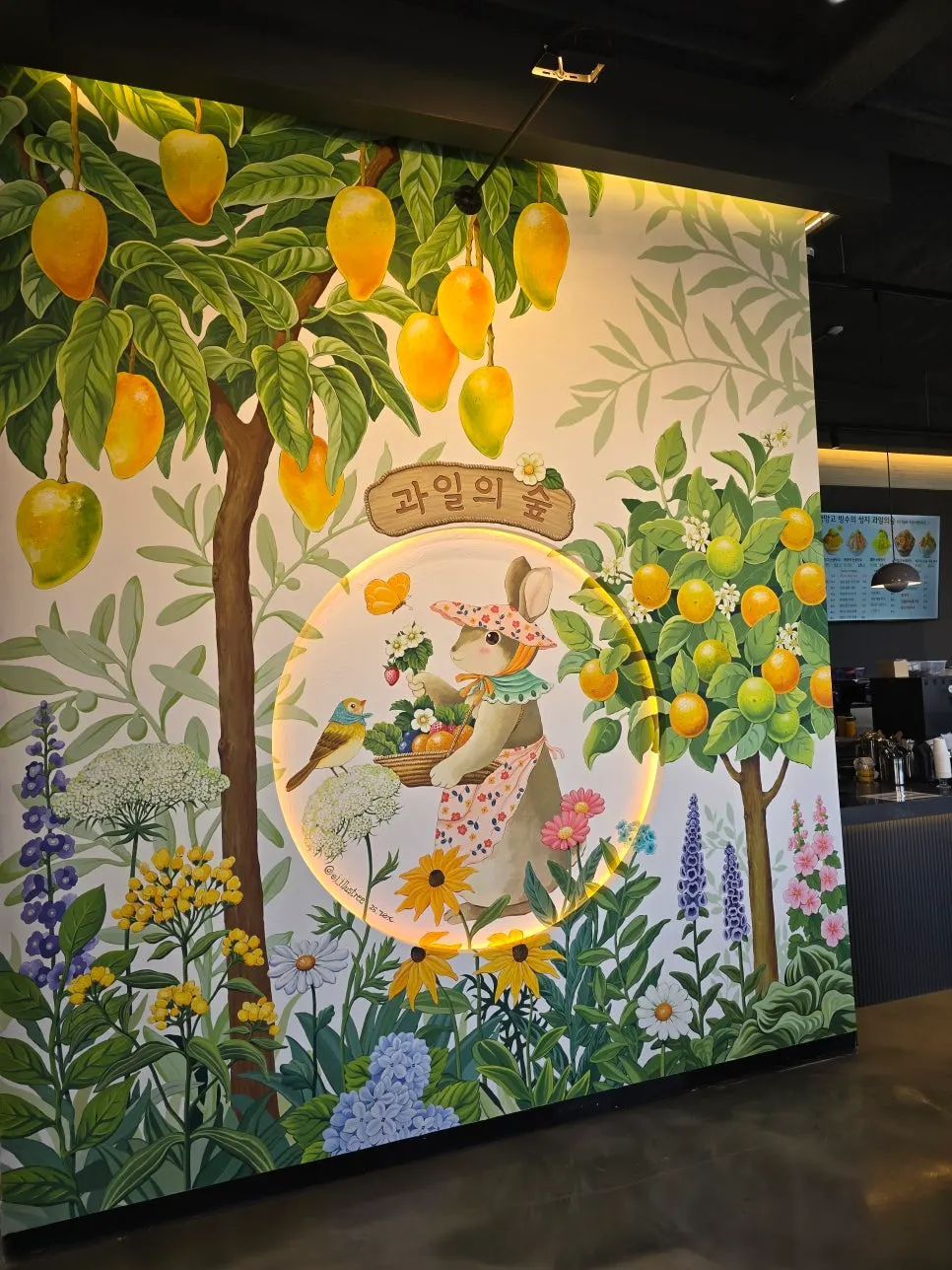 Café wall mural of mango and orange trees
