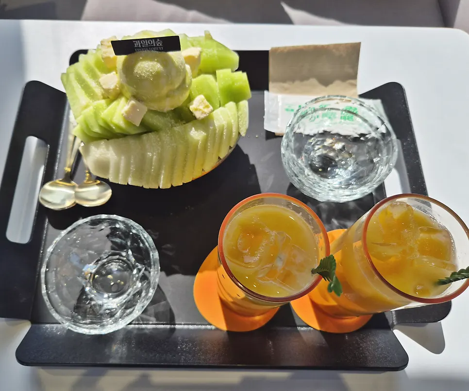 Melon snow bingsu on the café table
