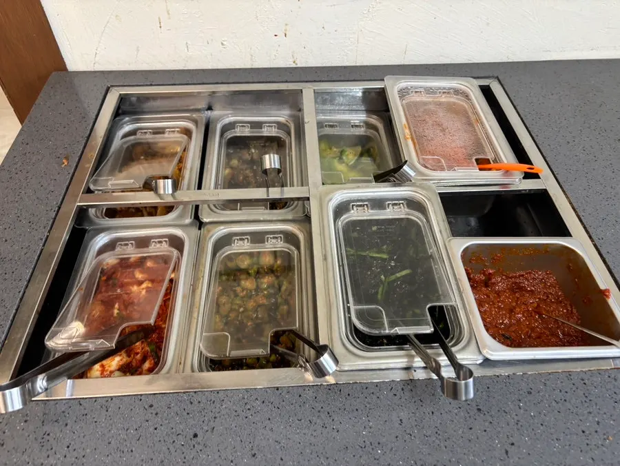 Wrap greens and side dishes at the self-serve corner
