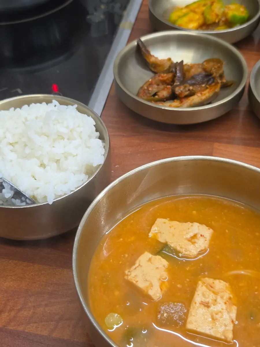Glossy rice scooped into a bowl