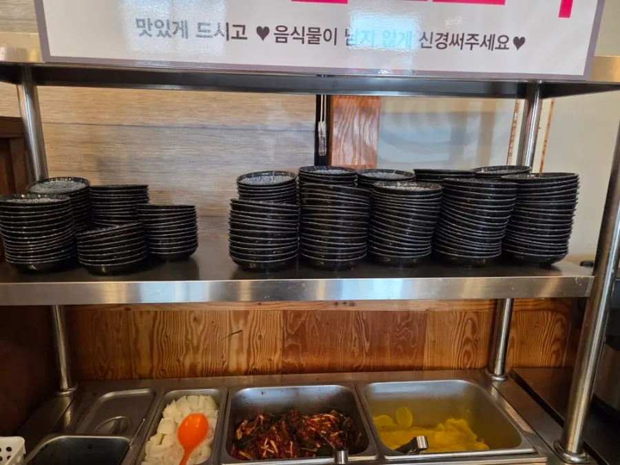 Self-serve bar with pickled radish and green onion kimchi