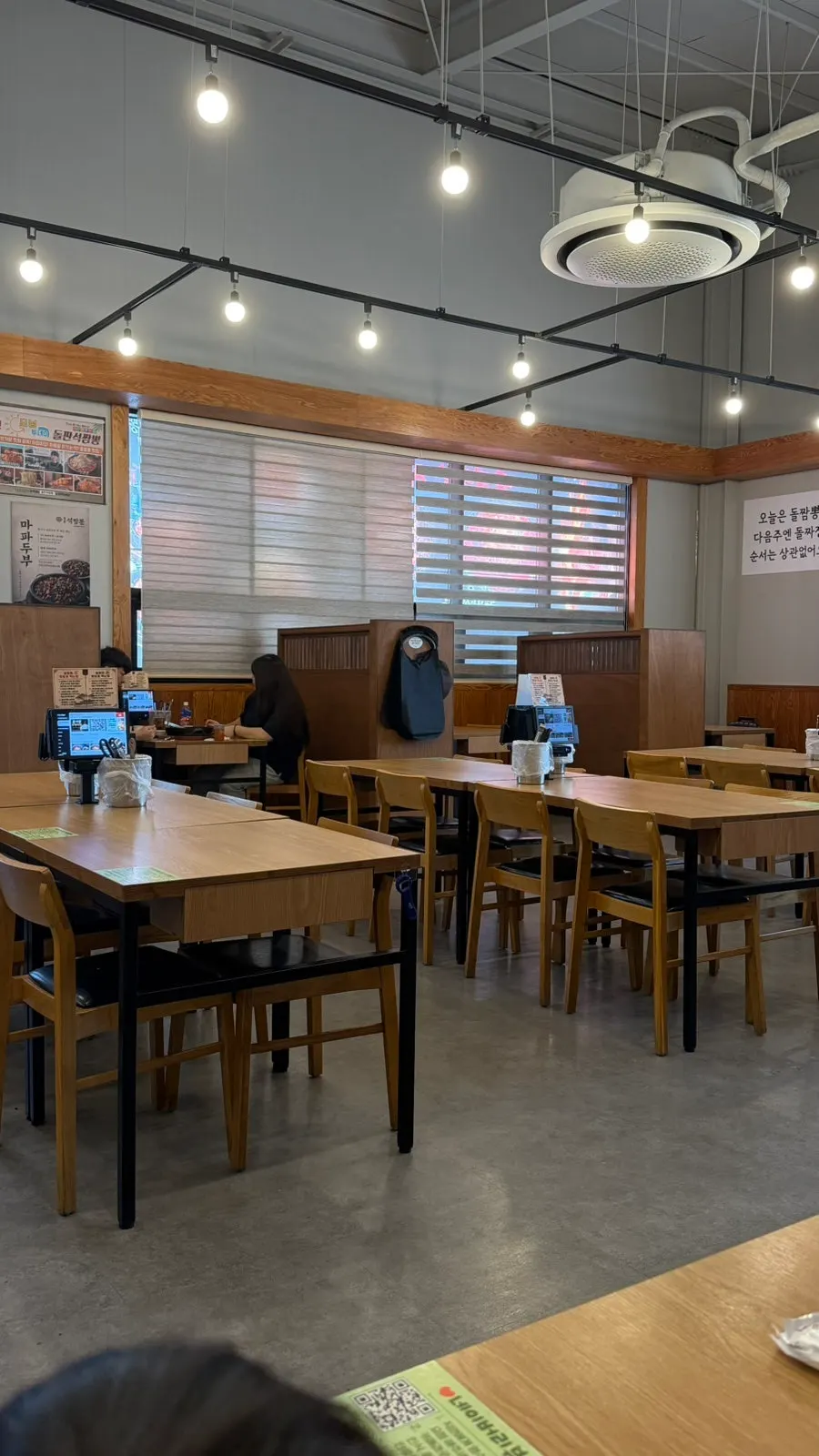 Interior of Dolpanseok Jjamppong with wide table spacing