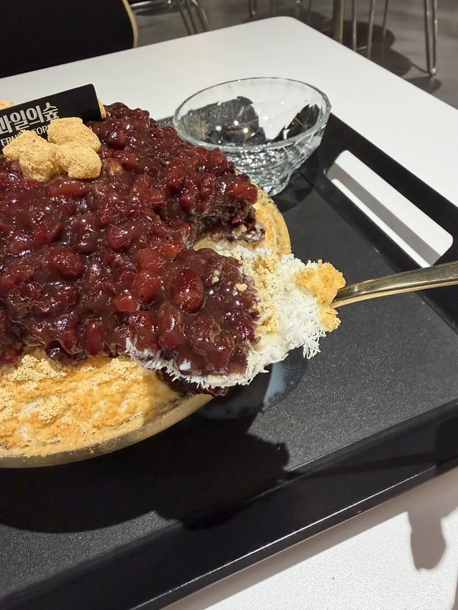 Close-up of patbingsu topped with injeolmi powder