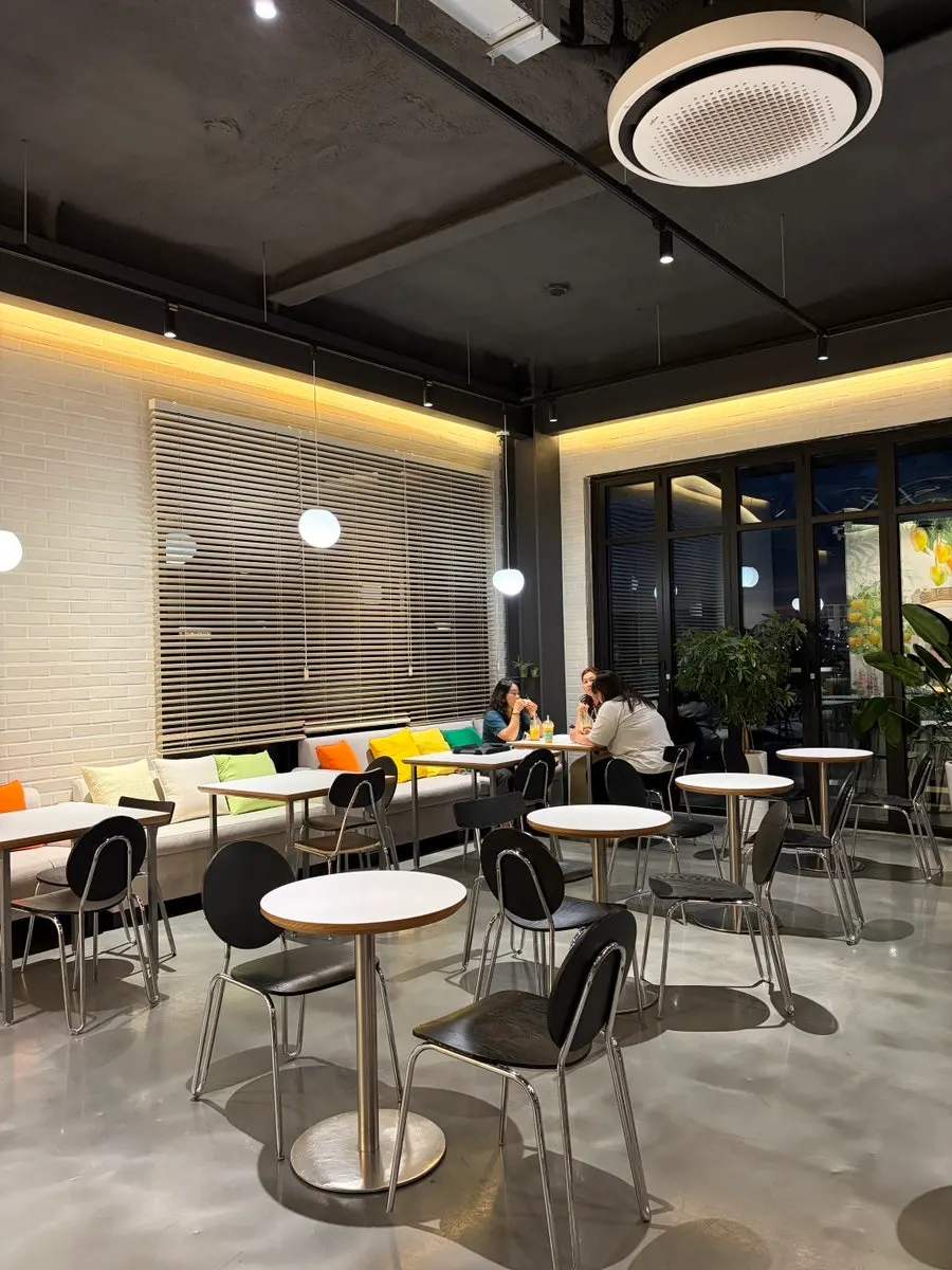 Interior of Fruit Forest with many tables
