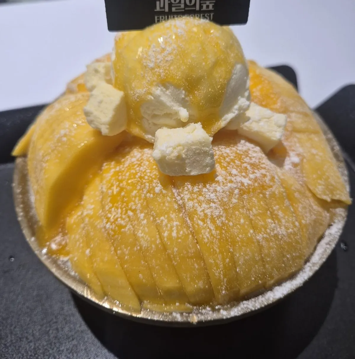 Fruit Forest's mango bingsu piled high with fresh mango