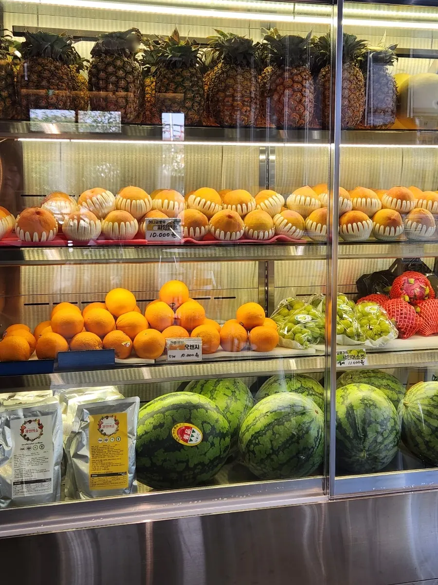 Menu board of bingsu and fresh fruit juices at Fruit Forest