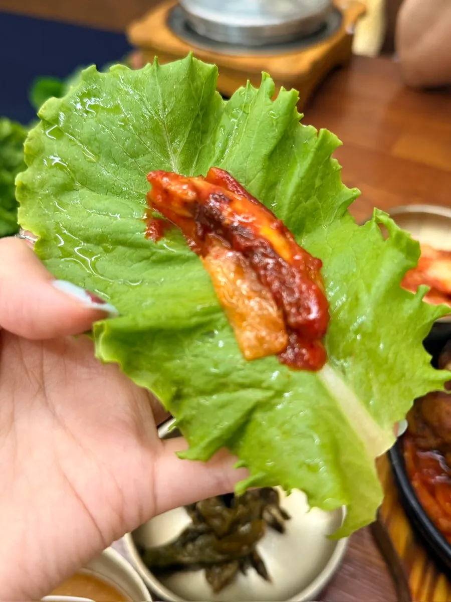 A wrap topped with thick soybean paste