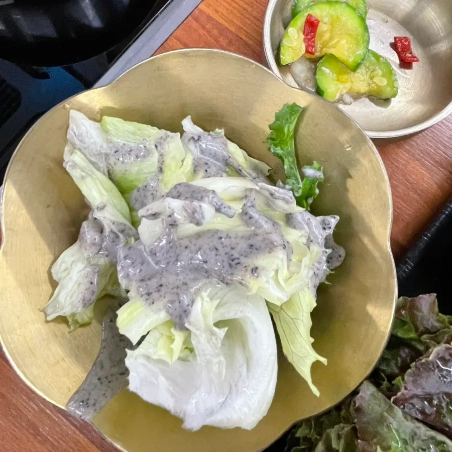 Salad topped with sesame dressing