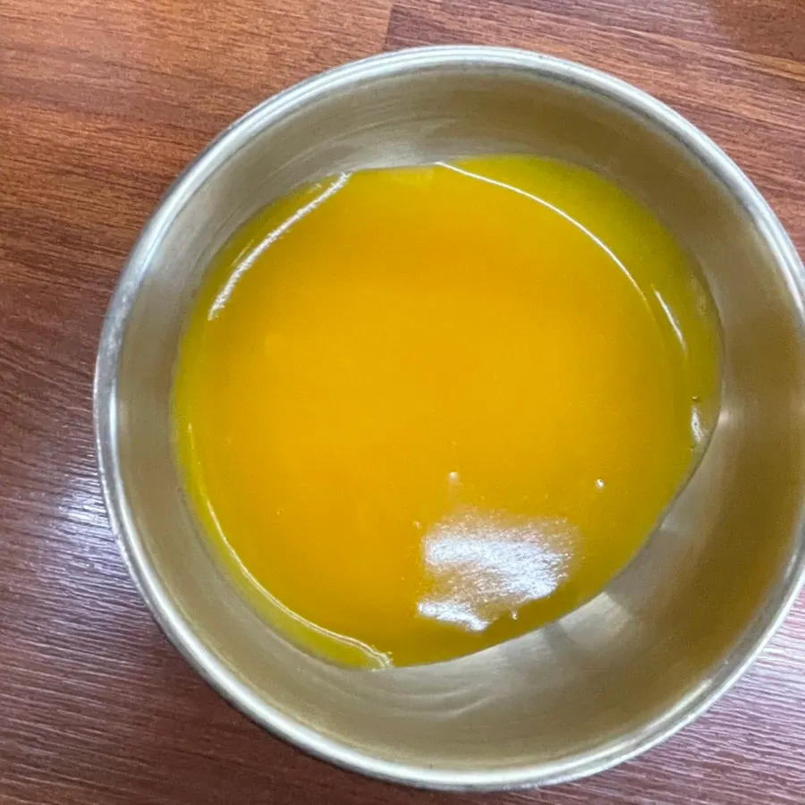 Pumpkin porridge served in a brass bowl