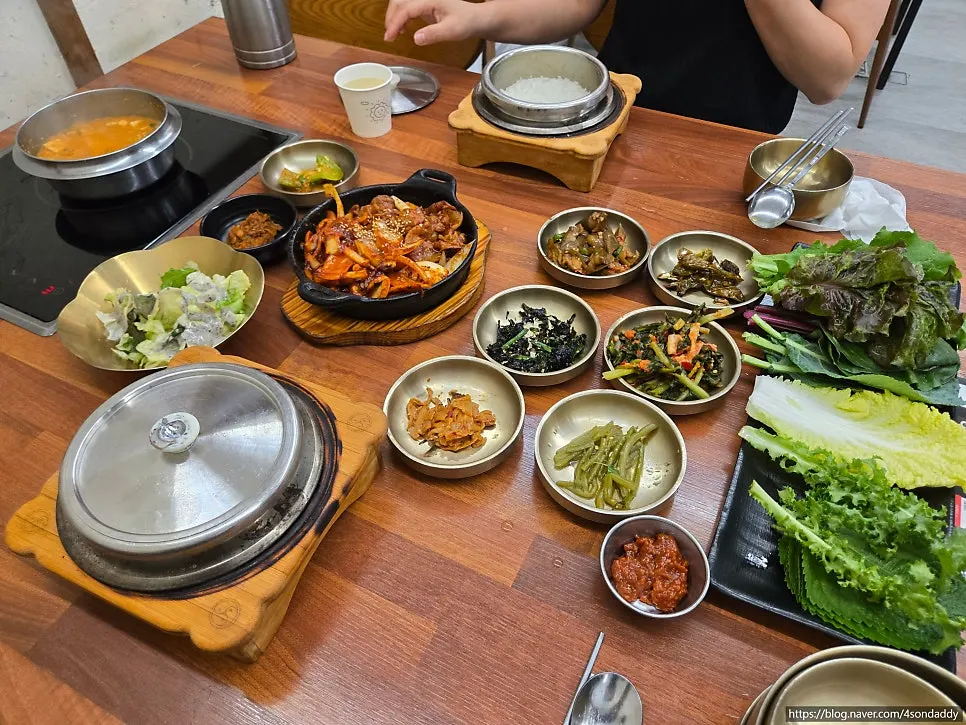 Full table spread of the deuljeongsik set for two
