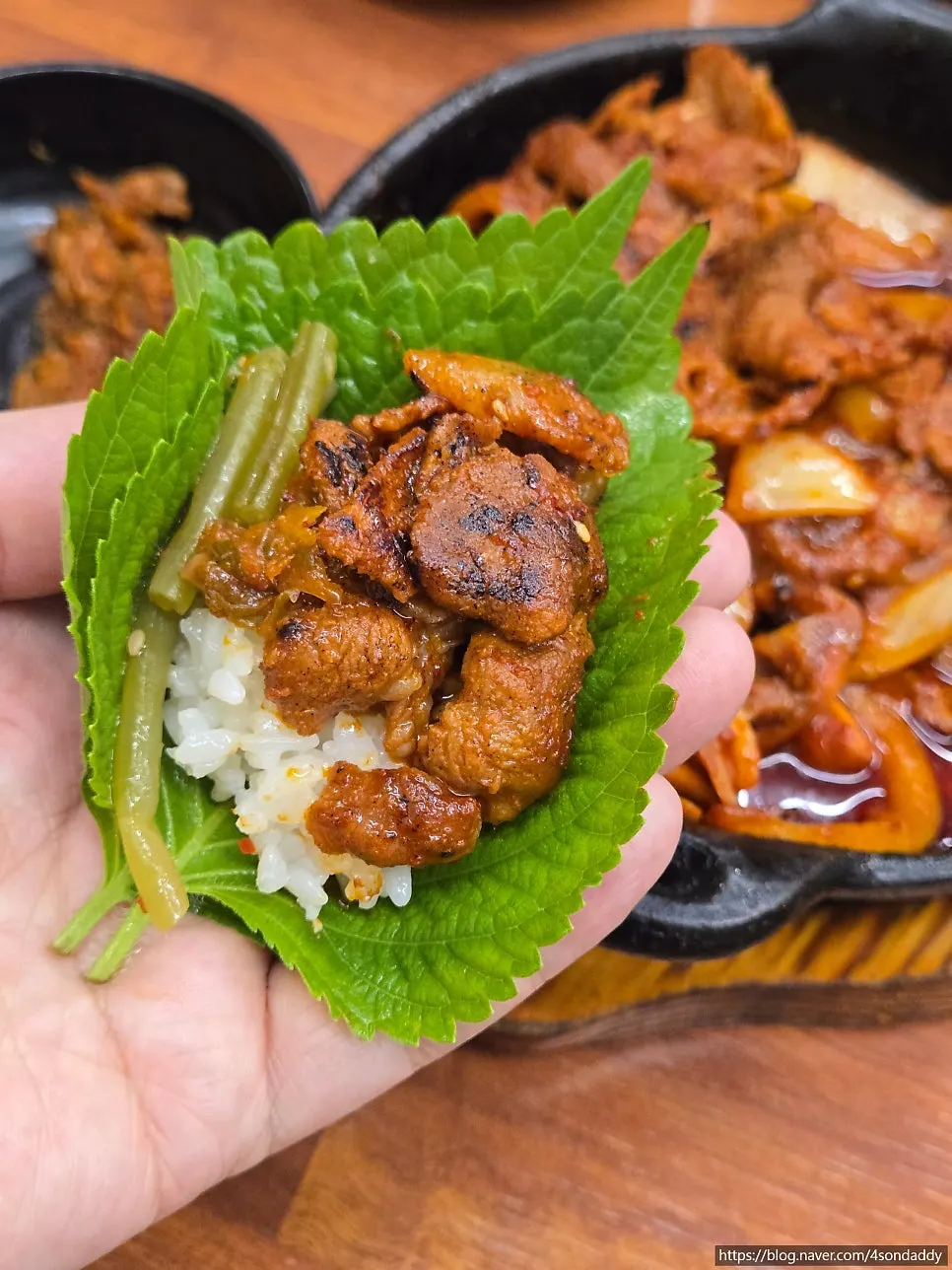A thick, chewy piece of stir-fried pork