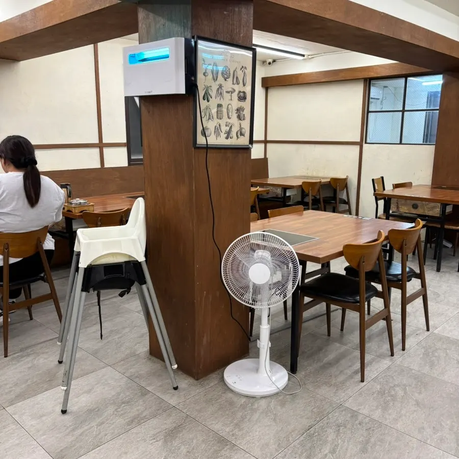 Table with stroller space and a baby chair