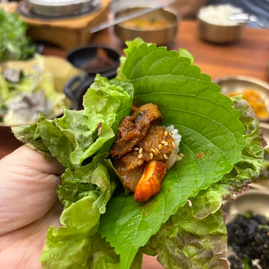 Pork and squid mixed and wrapped like osam bulgogi