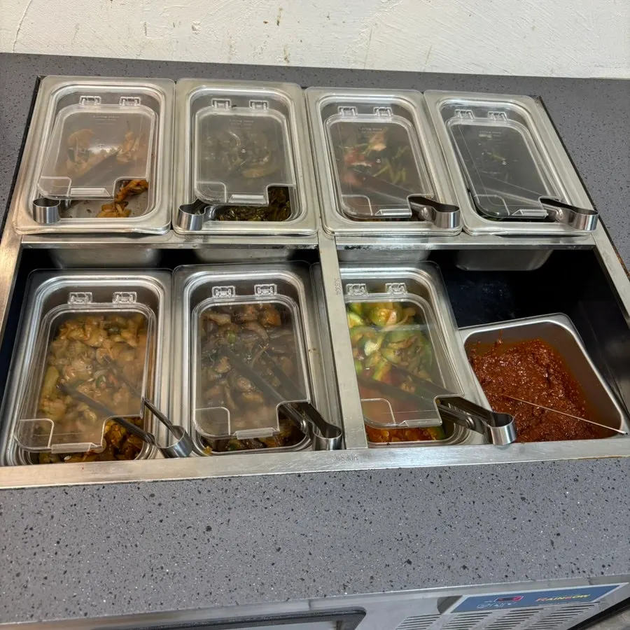 Self-serve bar for side dishes and wrap vegetables