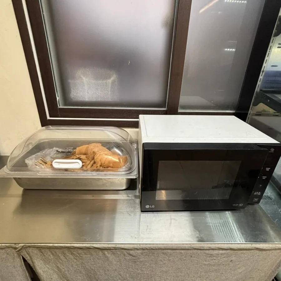 Corner with snacks and a microwave