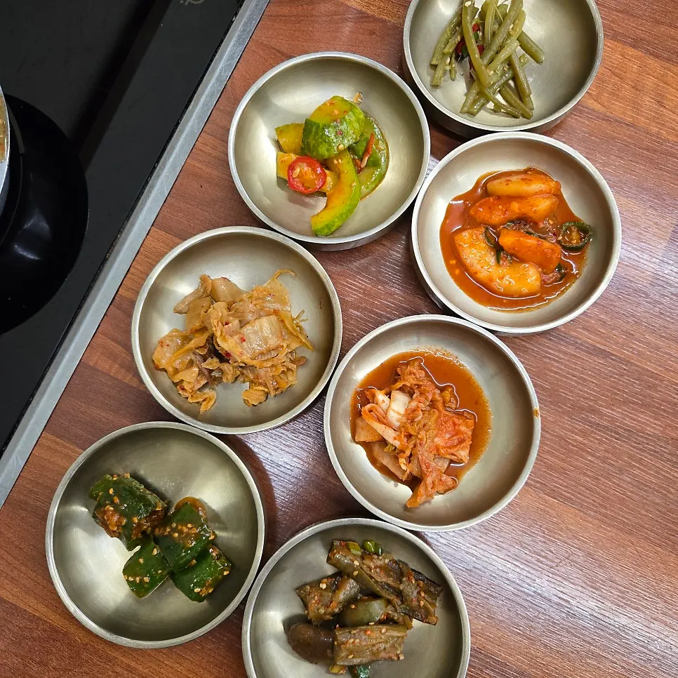 Basic table setting with doenjang stew and seven banchan