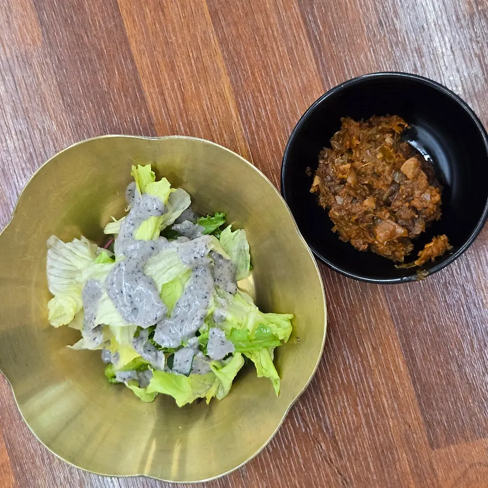 Lettuce salad with black sesame dressing and gangdoenjang