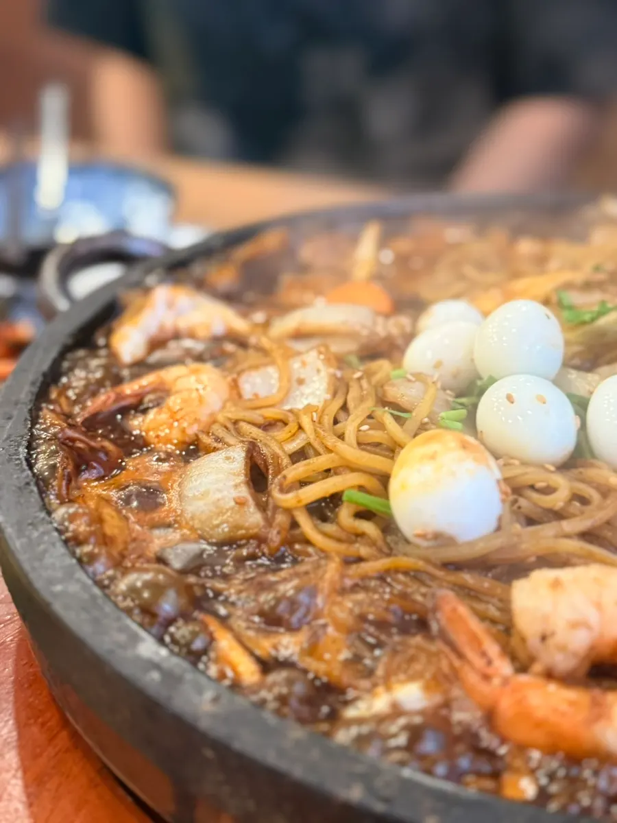 Chinese dish cooking on a stone plate
