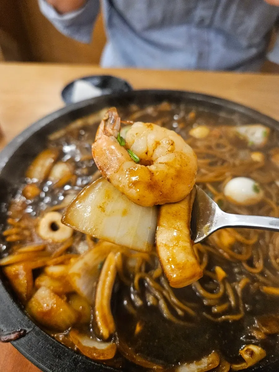 Jjajang and nurungji scorched onto the stone plate