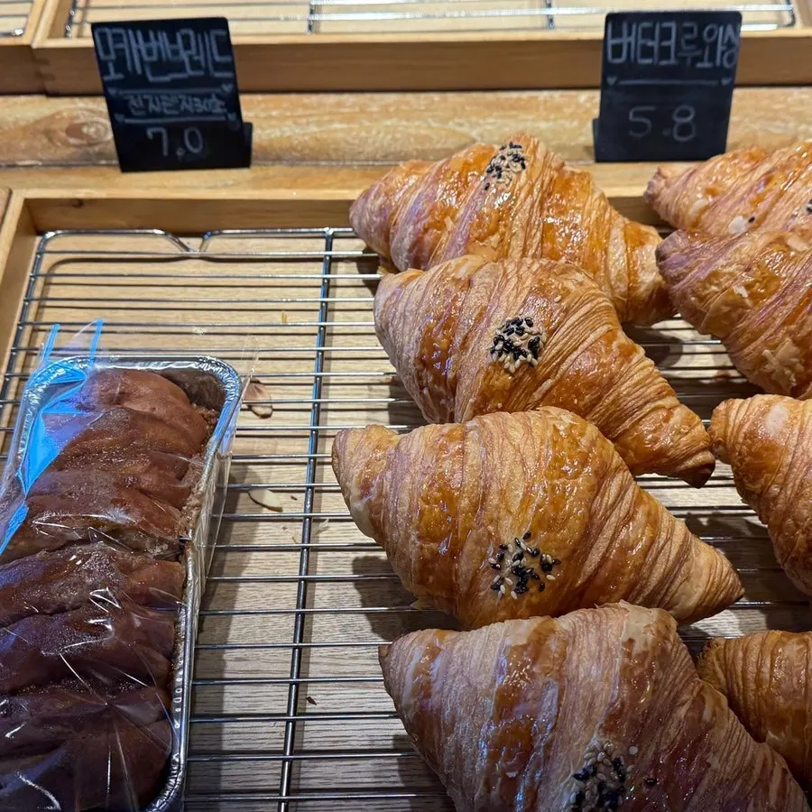 Bakery items including green onion cheese toast