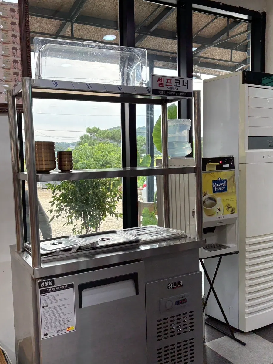 Self-service side-dish corner at Cheonje Guksu