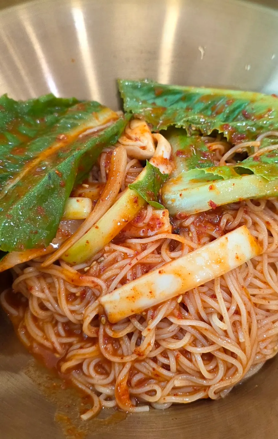 Bibim guksu topped with lettuce at Cheonje Guksu