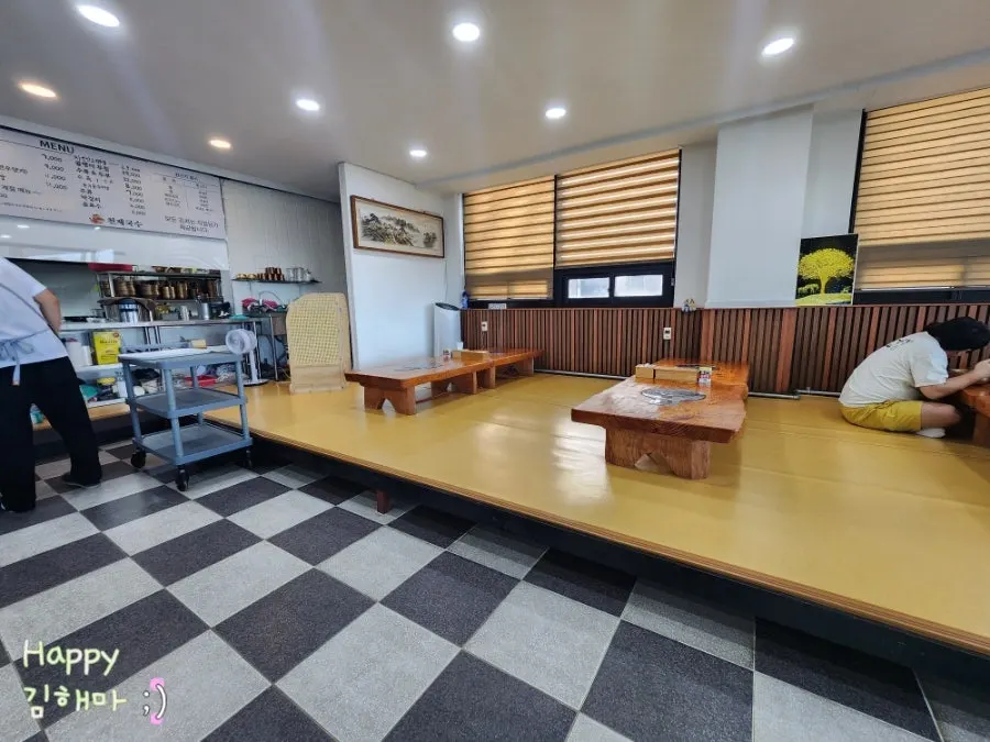 Interior with chair seating and ondol floor tables