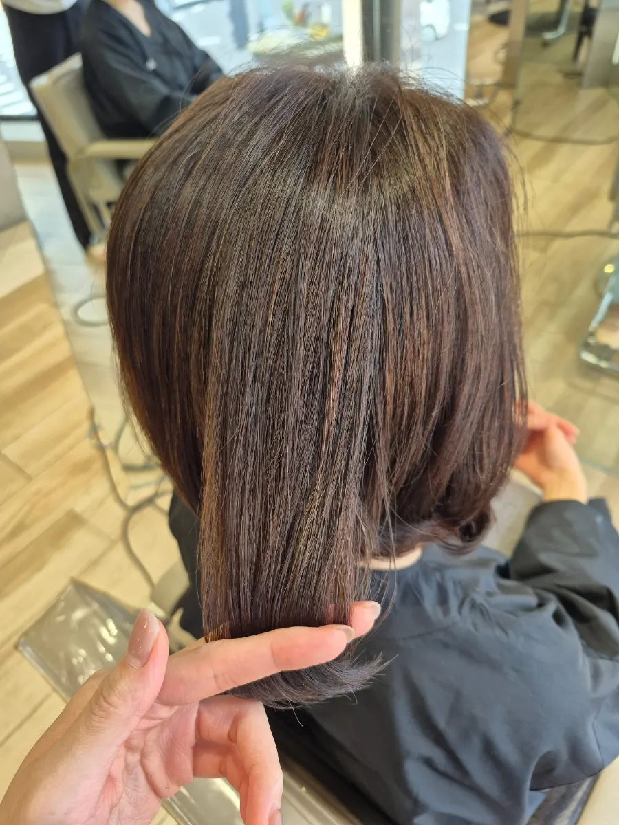 Pre-treatment hair dried out from gray coverage color and heat perm